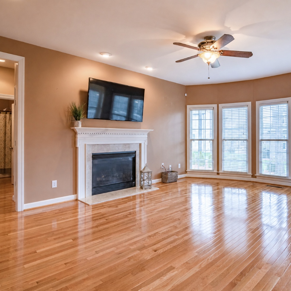 Charlotte Living Room With Beautiful Refinished Hardwood Floors